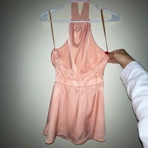 Halter open back peplum blush top